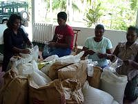 The home of Dr. Rupert Roopnaraine in Mahaica to witness the Foulis community packing the food hampers for their local community