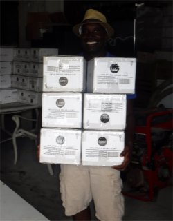 Pastor Dresner received his 6 
                    boxes of lights for distribution in the various organizations 
                    in the area unable to attend the seminar