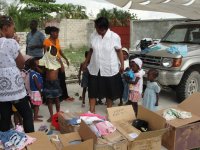 Dr. Yolander Thervil better known as Mama Yol joined Jenny Tryhane, Founder and Chairman of United Caribbean Trust in the distribution to the darling children at this small orphanage not far from the YTF Orphanage in Bon Repose.