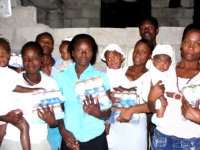 Pictures taken during a GAIN baby food distribution in Les Cayes shortly after the earthquake