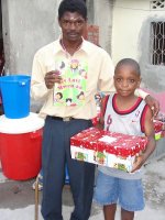 The Make Jesus Smile shoebox distribution took place outdoors at the Church of God school in Les Cayes.