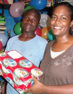 Cheron Rose Hardy the Founder of Hope Haven Orphanage in Cap Haitian distributing the Make Jesus Smile shoeboxes
