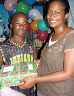 Cheron Rose Hardy the Founder of Hope Haven Orphanage in Cap Haitian distributing the Make Jesus Smile shoeboxes