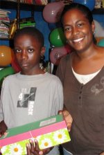 Cheron Rose Hardy the Founder of Hope Haven Orphanage in Cap Haitian distributing the Make Jesus Smile shoeboxes