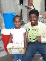 Seen here some more of your boxes being distributed at a Church of God school in Les Cayes. 