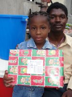 Seen here one of the Fitz Village Make Jesus Smile shoeboxes being delivered to a Church of God school in Les Cayes we were able to donate a Sawyer PointOne Community Water Filter Unit donated by Special Treasures in London, England.