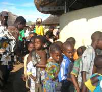 Malawi children receiving their Christmas gifts compliments of United Caribbean Trust working in association with Restoration Ministries International