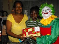 Mama Yol, the founder of the Yolanda Thervil Foundation seen here with Annie the clown who travelled all the way from Barbados
