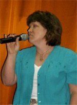 Michelle ministering in song
