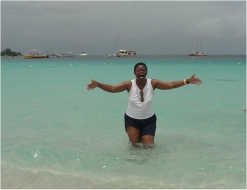 Dr B enjoying her first swim in the warm, beautiful waters of the Caribbean sea.