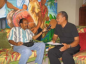 The above photograph shows Dr. Basil Springer, Chairman of Counterpart Caribbean (right) as he chats with St. Lucian reporter Ernie Seon. 