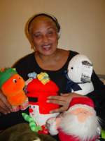 United Caribbean co-ordingator Dawnay with toys for the children of Grenada