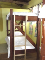 Bunk beds have been stained and repositioned in these bedrooms.