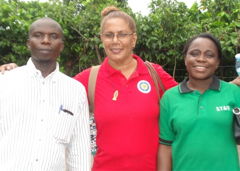 Pastor Tom and his wife the Headmistress at Faith Power Preparatory Nursery School in Bundibugio meet Lisa