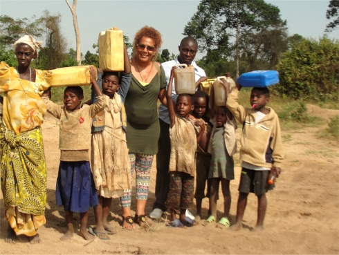 Children walk for miles to the Land Sand Mining borehole