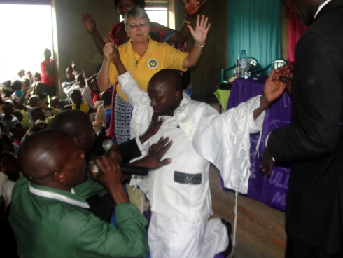 Rev Abraham Kisembo and Jenny on the mountain