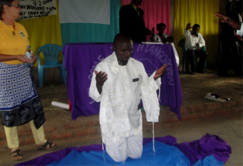 Rev Abrahams commissioning at Nyangrongo Full Gospel Pastors seminar child evangelism and Moringa Community Project training