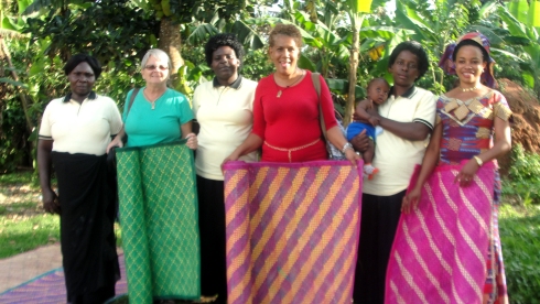 Jenny Lisa and Margie in Luwero receiving our mats