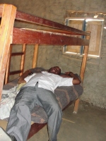 Bishop reclining on one of the bunk beds