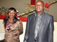 Bishop addressing the Beni, DR Congo Woman's Convention  with his wife