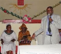 Bishop addressing the Beni, DR Congo Woman's Convention 