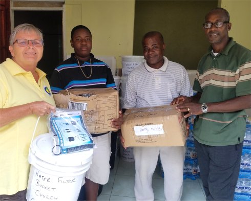 United Caribbean Trust Mission trip to help survivors of Hurricane Maria in Dominica with Sawyer filtered clean water as fears of an increase in cholera cases grow