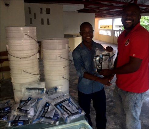 United Caribbean Trust Mission trip to help survivors of Hurricane Matthew in Haiti with Sawyer filtered clean water as fears of an increase in cholera cases grow 