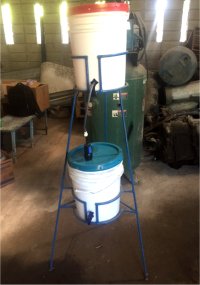 They have this wonderful invention to enable a community filter to be fully transportable. Emptying 5 gals of dirty river water filtered into a clean 5 gal bucket that has a tap to enable easy access to the filtered water.