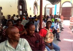 The Methodist Pastors and teachers waiting to receive their Community water filters.