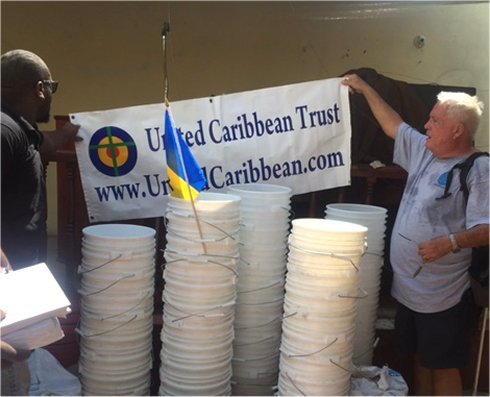 Haiti Mission trip Jeremie Methodist church water filter distribution to help survivors of Hurricane Matthew in Haiti with Sawyer filtered clean water as fears of an increase in cholera cases grow