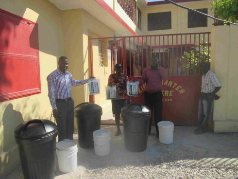 United Caribbean Trust Sawyer school distribution to help survivors of Hurricane Matthew in Haiti with Sawyer filtered clean water 