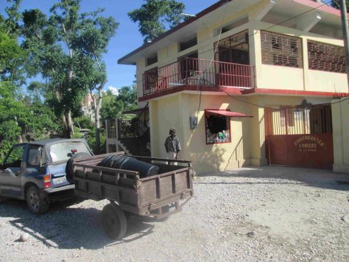 United Caribbean Trust Sawyer school distribution to help survivors of Hurricane Matthew in Haiti with Sawyer filtered clean water 