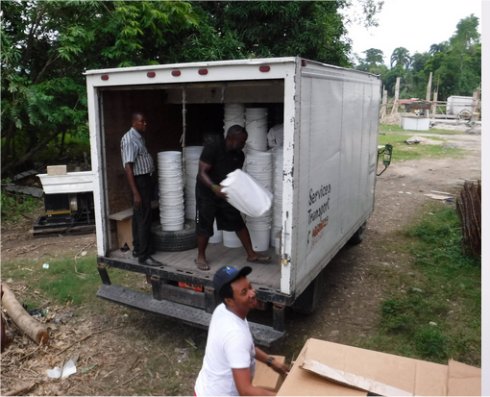 Haiti Mission trip Les Cayes water filter distribution to help survivors of Hurricane Matthew in Haiti with Sawyer filtered clean water as fears of an increase in cholera cases grow