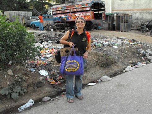 United Caribbean Trust founder Jenny Tryhane in Haiti following the earthquake delivering relief supplies to the prison