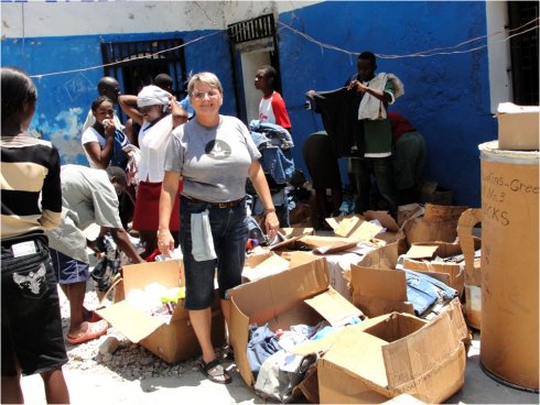 United Caribbean Trust founder Jenny Tryhane in Haiti following the earthquake delivering relief supplies to the prison