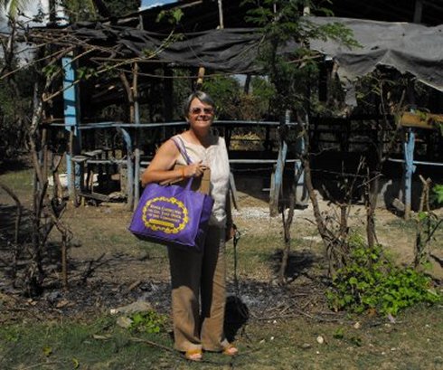 United Caribbean Trust founder Jenny Tryhane in Haiti following the earthquake delivering relief supplies to the prison