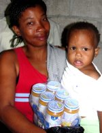 Pictures taken during a GAIN baby food distribution in Les Cayes shortly after the earthquake