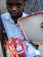 The Make Jesus Smile shoebox distribution took place outdoors at the Church of God school in Les Cayes.