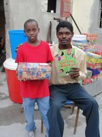 The Make Jesus Smile shoebox distribution took place outdoors at the Church of God school in Les Cayes.