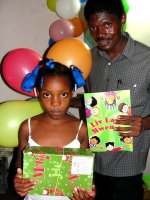 At last Pastor Banes was able to deliver the Make Jesus Smile shoeboxes to the children at his church.