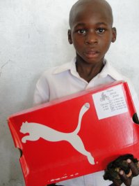 The children of St Marc receiving their Make Jesus Smile shoeboxes. 