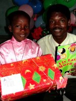 Torbeck Wesleyan church children receive their Make Jesus Smile shoeboxes