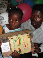 Haiti child receiving her gift