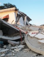 Haiti hit by massive earthquake</a> offices and shops in Port au Prince destroyed 