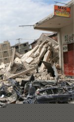 Haiti hit by massive earthquake</a> offices and shops in Port au Prince destroyed 