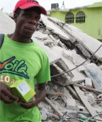 Haiti hit by massive earthquake</a> offices and shops in Port au Prince destroyed 