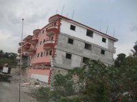 Haiti hit by massive earthquake</a> offices and shops in Port au Prince destroyed 