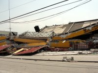 Haiti hit by massive earthquake</a> offices and shops in Port au Prince destroyed 