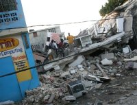 Haiti hit by massive earthquake</a> offices and shops in Port au Prince destroyed 