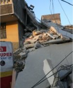 Haiti hit by massive earthquake</a> offices and shops in Port au Prince destroyed 